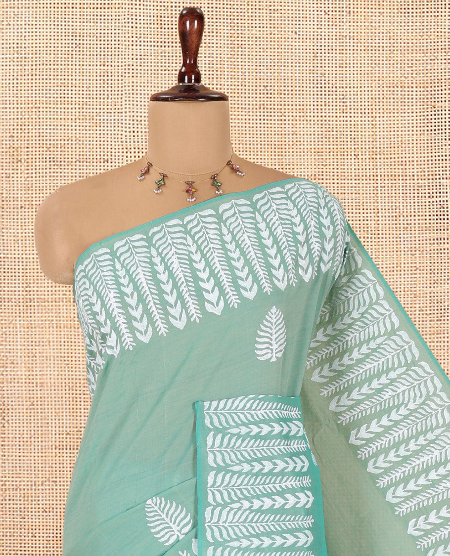 Green South Cotton Saree Features Tree Block-Print, a Bold Block-Printed Border, and a Contrast Blouse