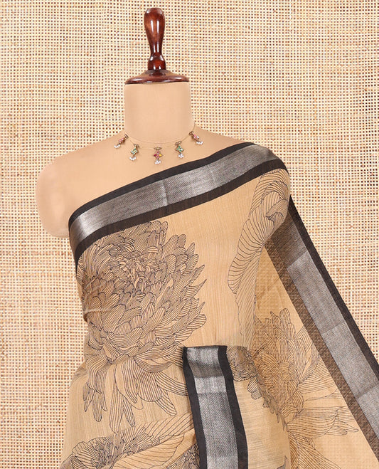 Chikku Jute Linen Saree, Decked Up with Tropical Floral Print, a Contrast Zari Border, Geometric Printed Pallu, and a Contrast Blouse