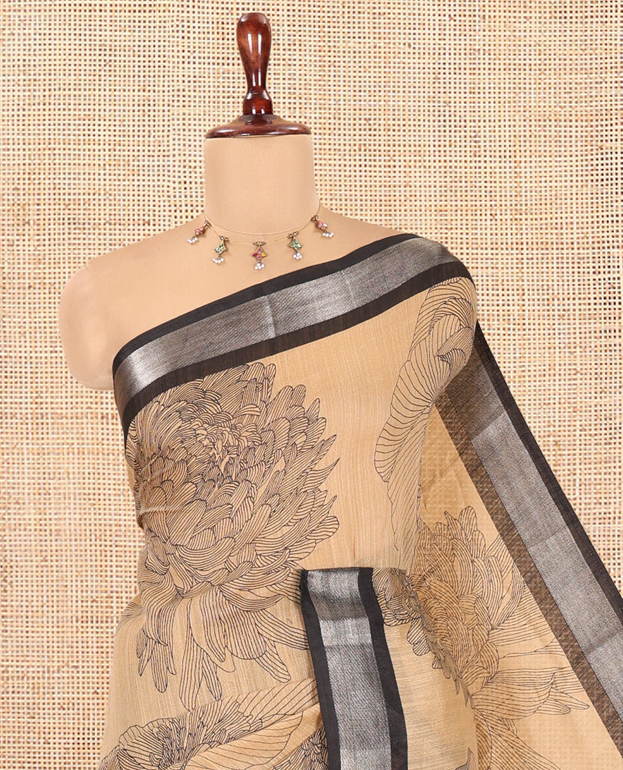 Chikku Jute Linen Saree, Decked Up with Tropical Floral Print, a Contrast Zari Border, Geometric Printed Pallu, and a Contrast Blouse