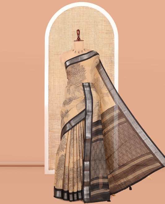 Chikku Jute Linen Saree, Decked Up with Tropical Floral Print, a Contrast Zari Border, Geometric Printed Pallu, and a Contrast Blouse