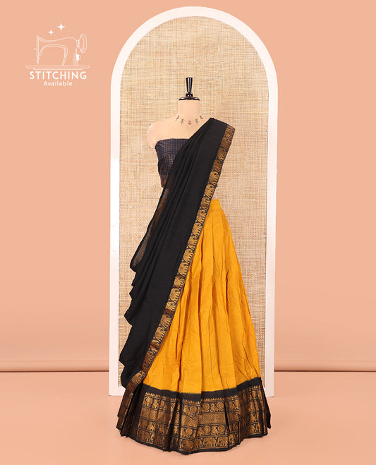 Yellow and Black Plain Sungudi Cotton Half-saree, Complemented by Captivating Contrast Traditional Zari Border of Temple, Peacock, and Elephant Designs, Paired with a Contrast Zari Checked Blouse, and Comes with a Zari-Bordered Vichitra Silk Dhavani