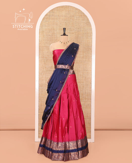 Pink and Blue Semi-Banarasi Half-Saree, Accentuated with Zari Buttas on Its Skirt, Complemented by a Contrast Rettai Pettu Traditional Zari-Design Border, Paired with a Matching Blouse, and Comes with a Contrast Satin Georgette Embroidered Dhavani