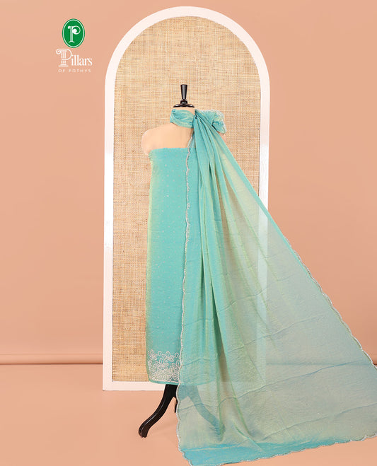 Green Moss Organza Material Churidar Set, Decorated with Floral Embroidery and Stone Struck on Its Top, a Plain Santoon Bottom, and Paired with a Moss Organza Stone Work Scallop Dupatta