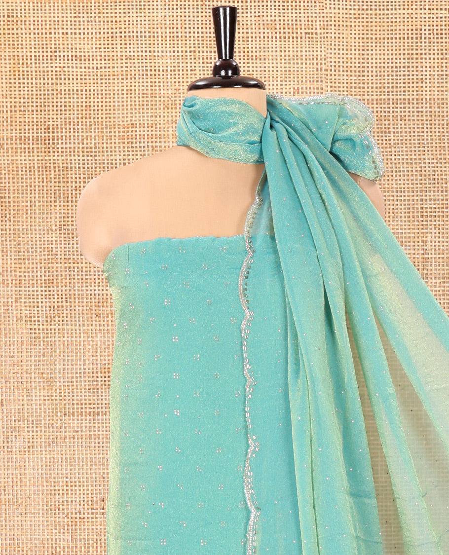 Green Moss Organza Material Churidar Set, Decorated with Floral Embroidery and Stone Struck on Its Top, a Plain Santoon Bottom, and Paired with a Moss Organza Stone Work Scallop Dupatta