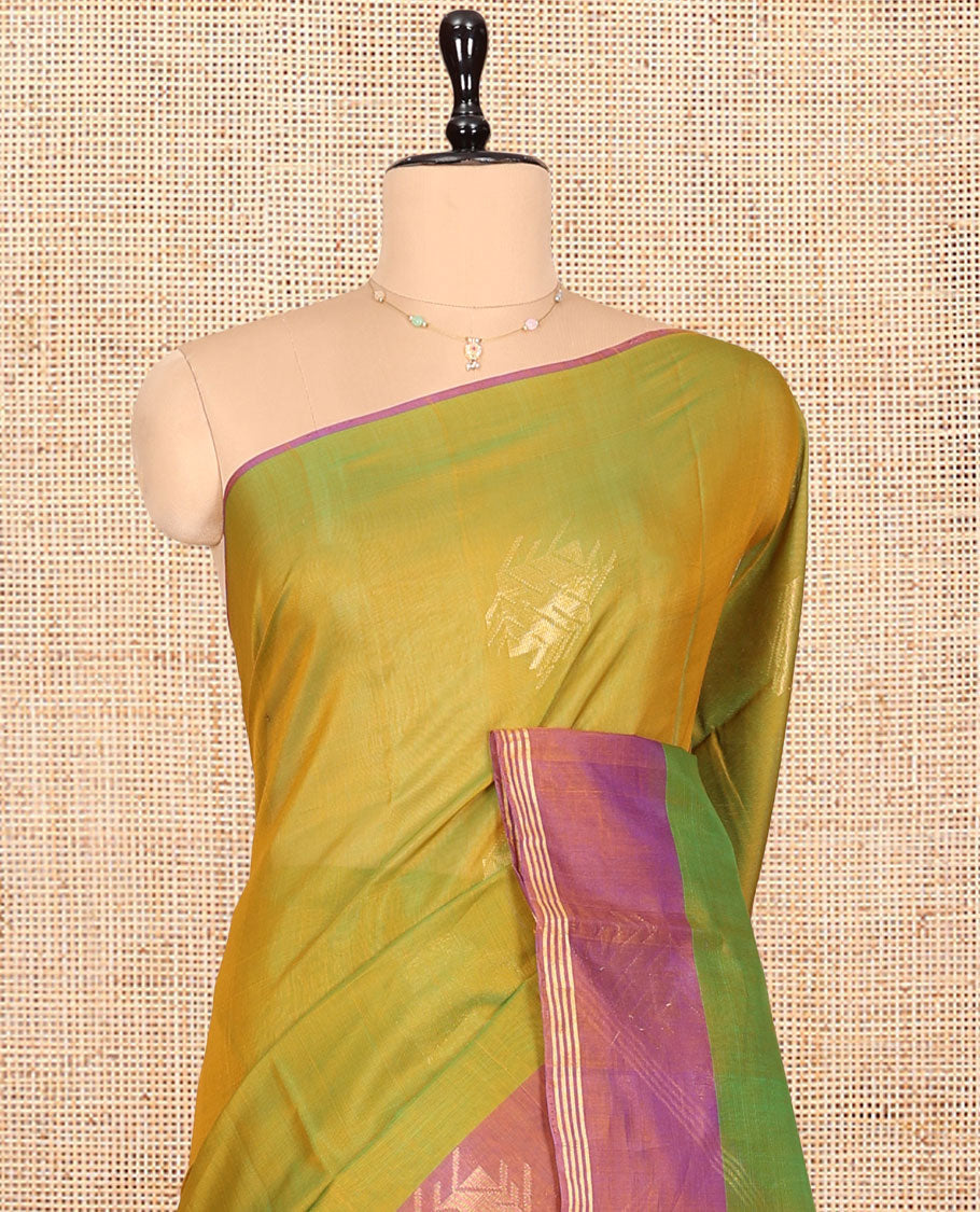 Green Silk Cotton Saree, Decked Up with Zari Buttas, Complemented by Contrast Zari Border, a Pallu of Geometric Designs, and Contrast Blouse