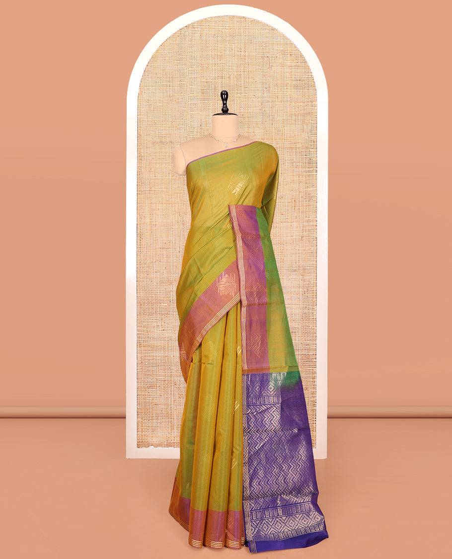 Green Silk Cotton Saree, Decked Up with Zari Buttas, Complemented by Contrast Zari Border, a Pallu of Geometric Designs, and Contrast Blouse