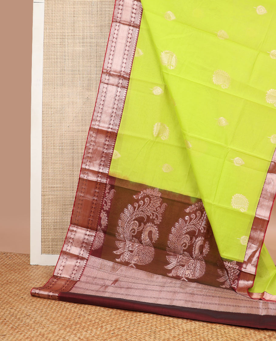 Light green motifs silk cotton saree with contrast zari design border & peacock design, striped pallu