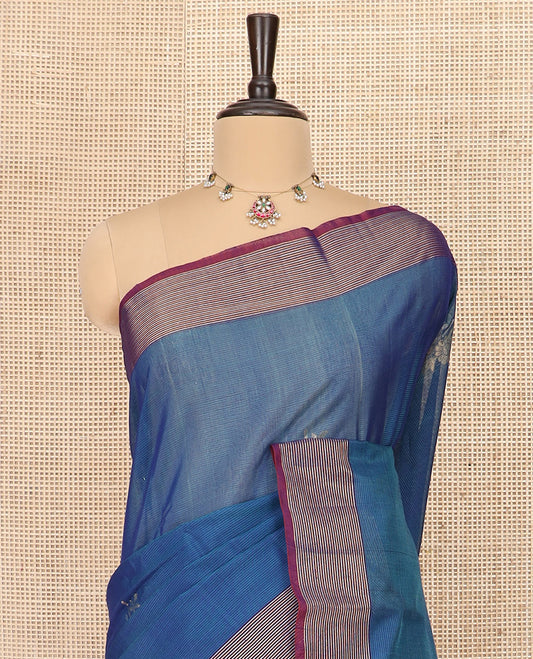 Blue Silk Cotton Saree Woven with Floral Buttas All Over the Body, Complemented by a Contrast Zari Striped Border, Featuring a Pallu of Jaal Designs, and Paired with a Contrast Blouse