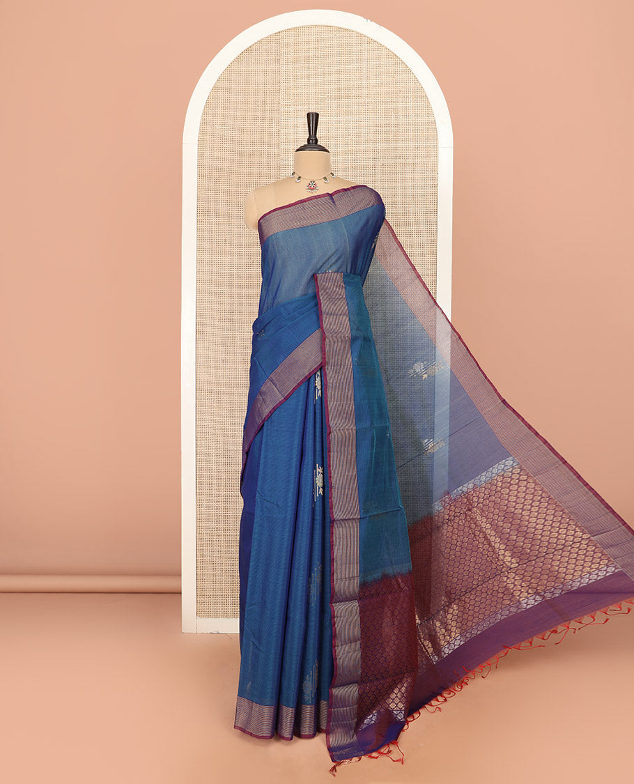 Blue Silk Cotton Saree Woven with Floral Buttas All Over the Body, Complemented by a Contrast Zari Striped Border, Featuring a Pallu of Jaal Designs, and Paired with a Contrast Blouse
