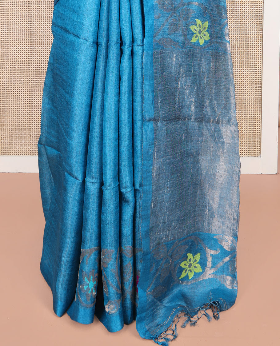 Blue Plain Tussar Silk Saree, Highlighted by Floral Creeper Design Border, Gleaming Zari Pallu, and Paired with a Contrast Blouse
