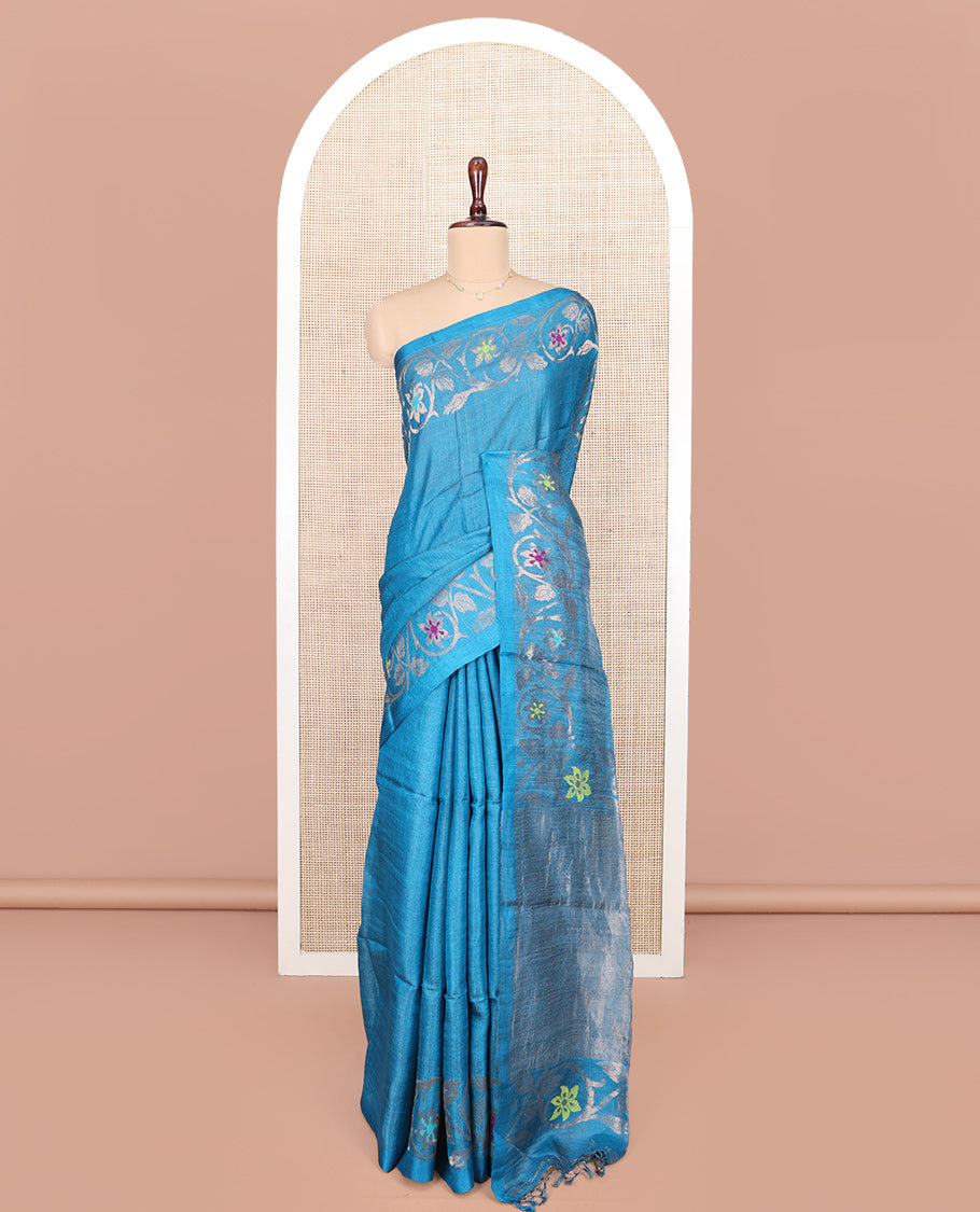 Blue Plain Tussar Silk Saree, Highlighted by Floral Creeper Design Border, Gleaming Zari Pallu, and Paired with a Contrast Blouse