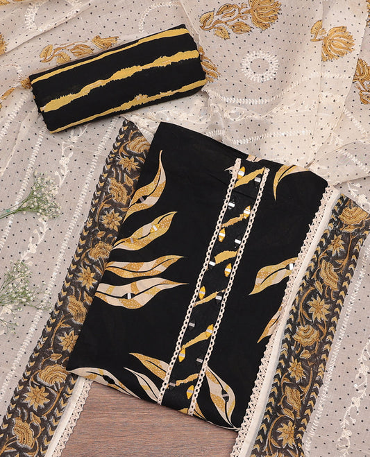 Black-Yellow Cotton Material Churidar Set Features Tropical Floral Print and Mirrorwork Top, Printed Bottom, and Contrast Print-Embroidered Dupatta