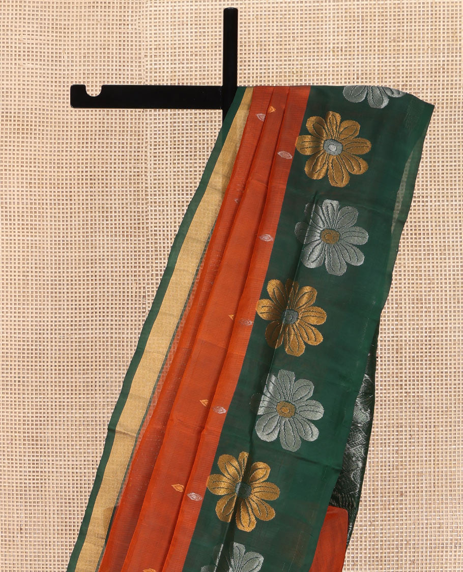 Orange Uppada Silk Saree, Woven with Zari Buttas on Its Body, Complemented by a Contrast Border of Eight-Petal Flower Motifs, Pallu of Paisley and Diamond Designs, and Paired with a Contrast Blouse