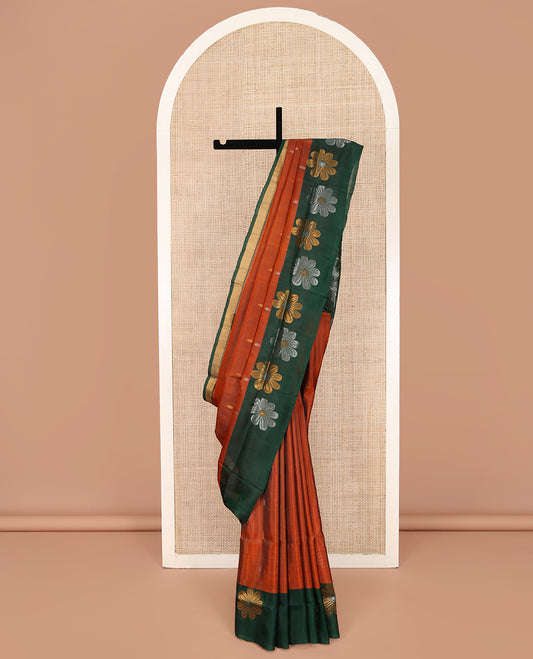 Orange Uppada Silk Saree, Woven with Zari Buttas on Its Body, Complemented by a Contrast Border of Eight-Petal Flower Motifs, Pallu of Paisley and Diamond Designs, and Paired with a Contrast Blouse
