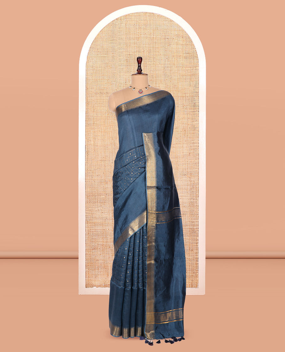 Blue Banana Pith Saree, Gleamed Up with Checks and Buttas, a Zari Temple Border, Striped Pallu, and Matching Blouse