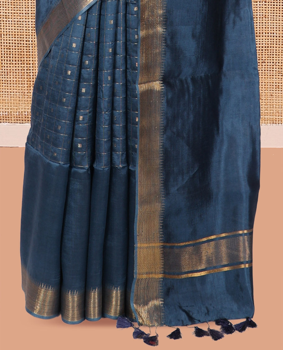 Blue Banana Pith Saree, Gleamed Up with Checks and Buttas, a Zari Temple Border, Striped Pallu, and Matching Blouse