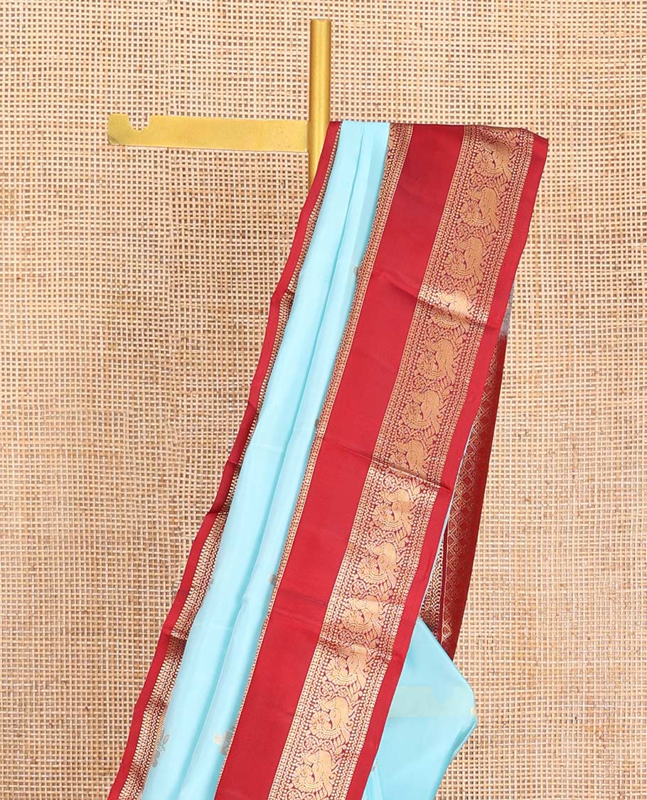 Blue Vasundhara Lite-Silk Mix Saree, Gleamed Up with Zari Buttas, Complemented by Contrast Rettai Pettu Border Featuring Diamond, Neli, Muthu, and Mayil Designs, Grandly Woven Pallu of Jaal Designs, and Paired with a Contrast Blouse