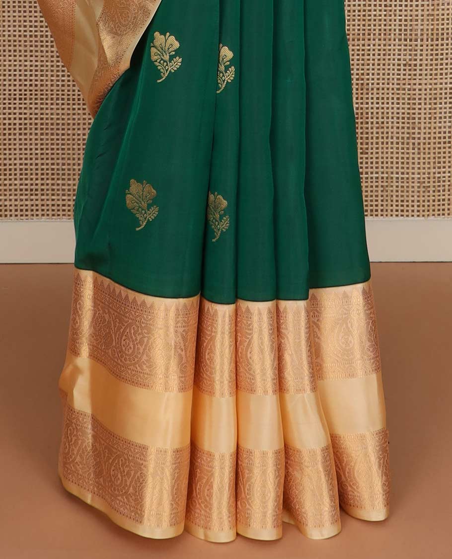 Green zari buttas Vasundhara silk mix saree, contrast rettai pettu border of rekku, muthu, neli, and manga designs, and ogee patterned pallu