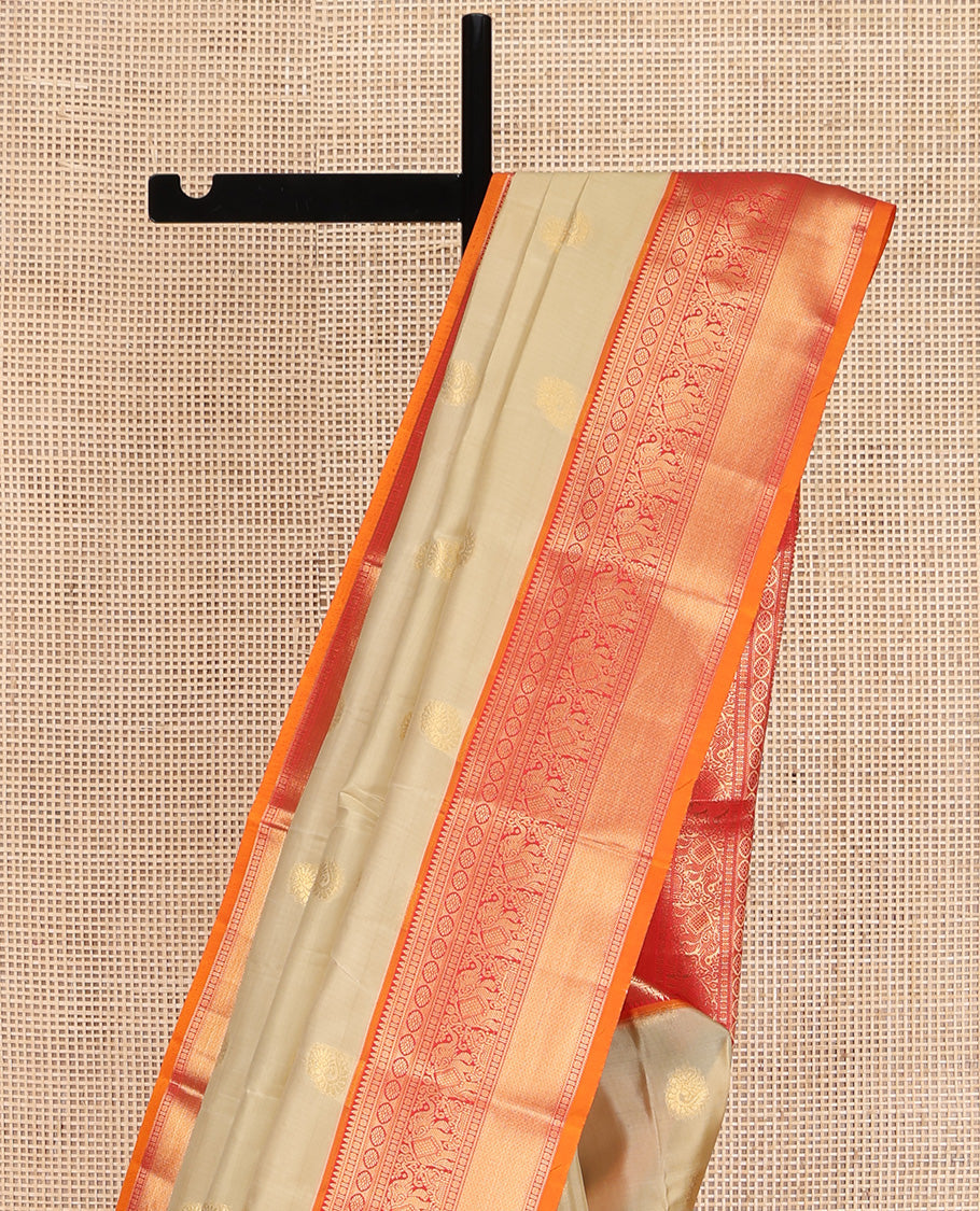 Sandal Vasundhara Lite Silk Mix Saree, Subtly Sparkled with Zari Buttas on Its Body, Complemented by a Contrast Border of Rekku, Rudraksham, Laddu Kamalam, Yaanai, and Mayil Kann Designs, Grand Jaal Pallu, and Paired with a Contrast Blouse