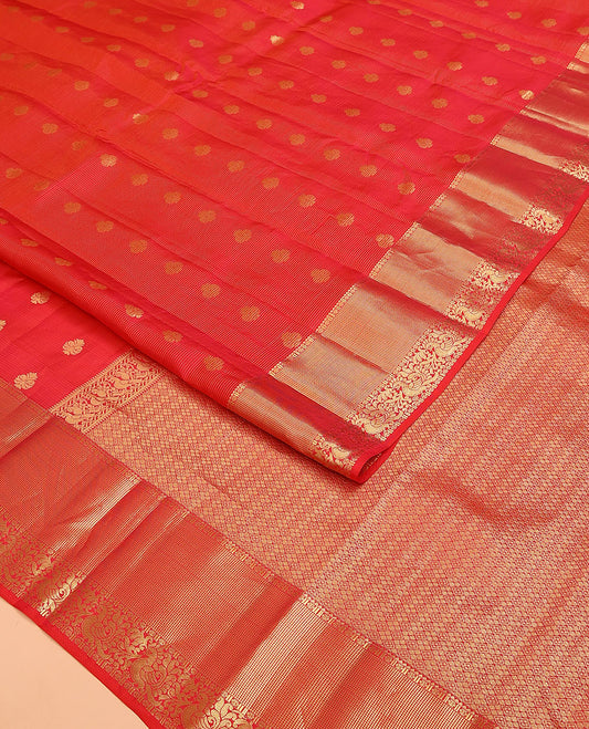 Red Vasundhara Lite Silk Mix Saree, Subtly Sparkled with Zari Buttas and Stripes on Its Body, Highlighted by Zari Border of Rekku, Muthu, and Mayil Designs, Grand Jaal Pallu, and Paired with a Matching Blouse