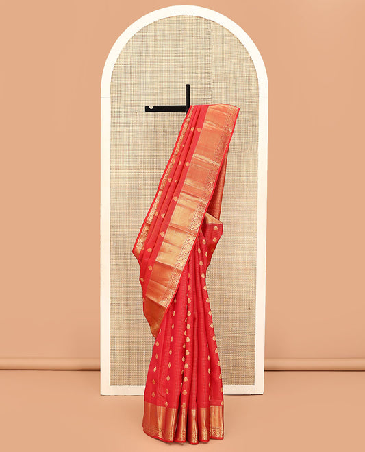 Red Vasundhara Lite Silk Mix Saree, Subtly Sparkled with Zari Buttas and Stripes on Its Body, Highlighted by Zari Border of Rekku, Muthu, and Mayil Designs, Grand Jaal Pallu, and Paired with a Matching Blouse