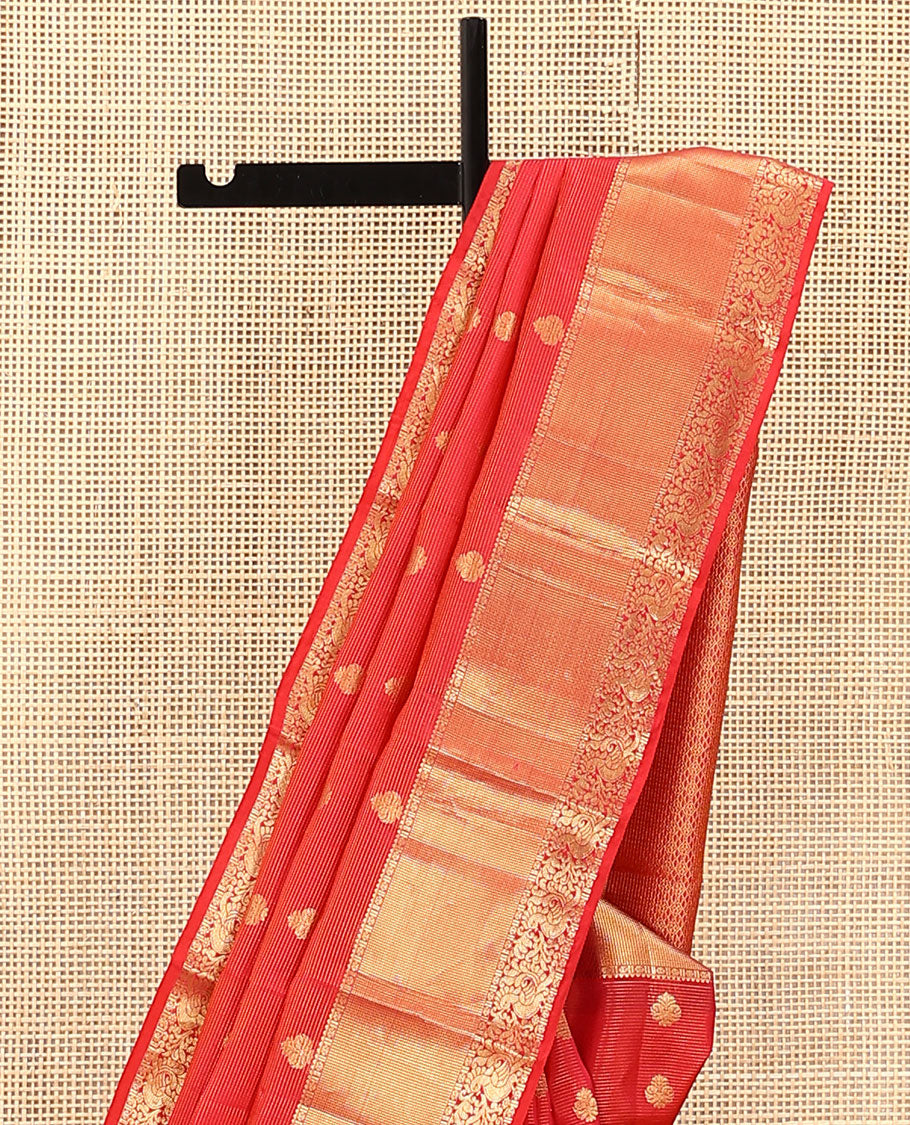 Red Vasundhara Lite Silk Mix Saree, Subtly Sparkled with Zari Buttas and Stripes on Its Body, Highlighted by Zari Border of Rekku, Muthu, and Mayil Designs, Grand Jaal Pallu, and Paired with a Matching Blouse