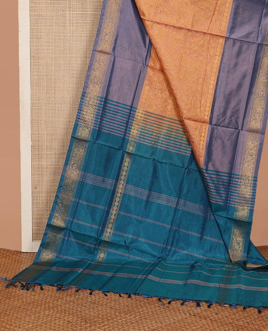Orange jacquard banana pith saree, contrast traditional zari border, and striped pallu