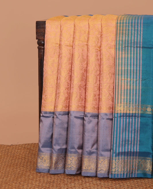 Orange jacquard banana pith saree, contrast traditional zari border, and striped pallu