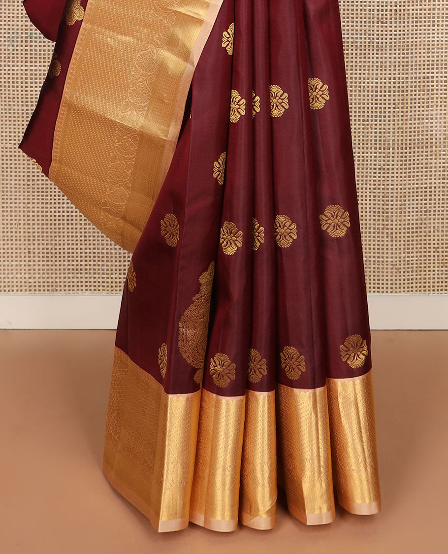 Maroon zari buttas silk saree, contrast border of salangai, ara bogudi, mayil kann & kodi visiry & seppu rekku pallu of floral motifs