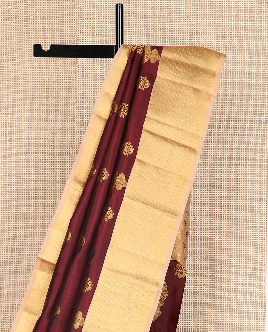 Maroon zari buttas silk saree, contrast border of salangai, ara bogudi, mayil kann & kodi visiry & seppu rekku pallu of floral motifs