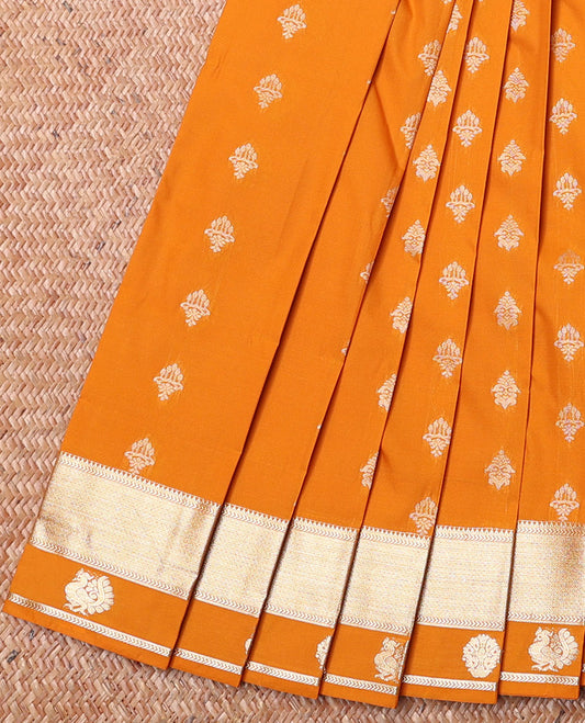 Orange Budget Silk Saree, Opulently Embellished with Zari Buttas on Its Body, Highlighted by Traditional Zari Design Border of Peacock Designs, Captivating Contrast Pallu of Jaal Designs, and Paired with a Contrast Blouse
