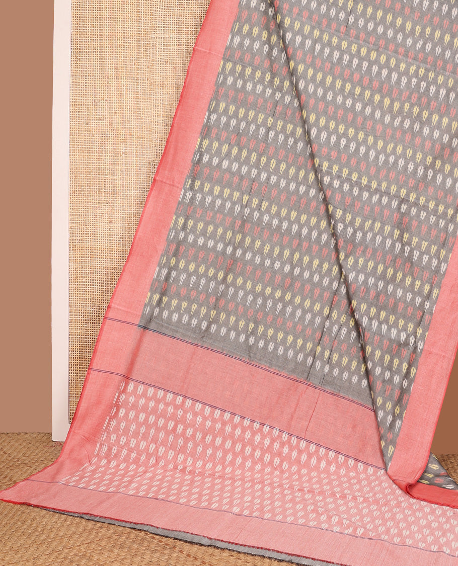 Grey buttas ikkat cotton saree, contrast plain peach border, and pallu of buttas