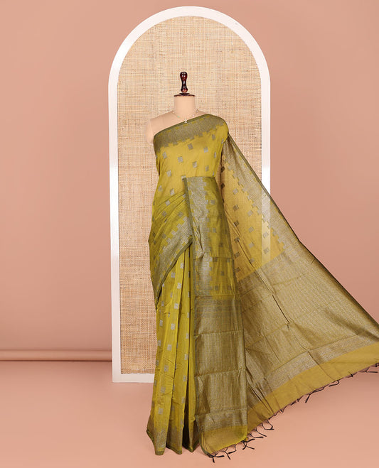 Green Semi-Silk Cotton Saree, Woven with Zari Buttas All Over Its Body, Gleaming Zari Design Border, Intricately Zari-Designed Pallu, and Paired with a Matching Blouse