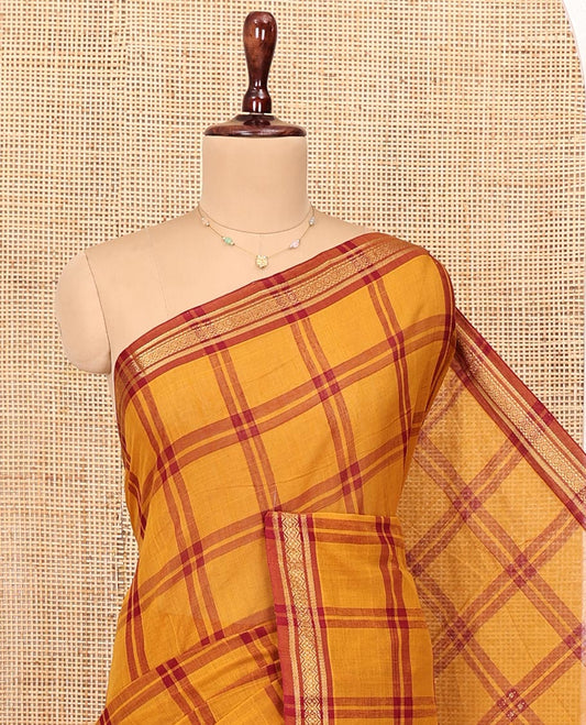 Yellow Andhra Cotton Saree, Finely Crafted with Checked Design All Over Its Body, Subtly Sparkled Traditional-Patterned Border, Contrast Pallu of Stripes and Ikkt Designs, and Paired with a Matching Blouse