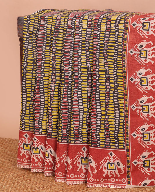 Brown geometric machine-printed kalamkari cotton saree, contrast printed border & pallu of Patola-style elephant motifs print