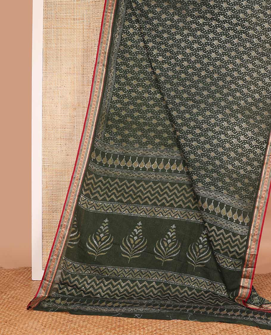Dark mehendi green batik printed mul mul cotton saree, contrast traditional thread border, and pallu of intricate print