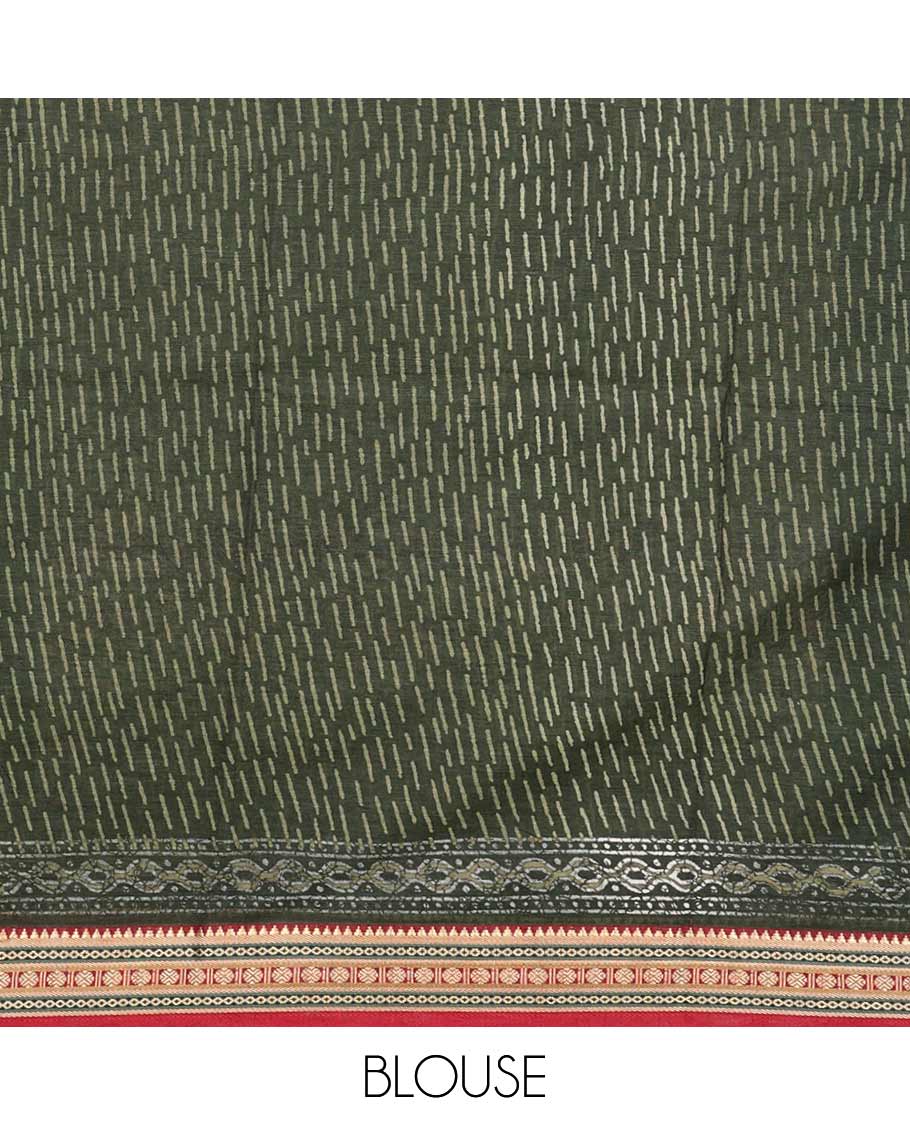Dark mehendi green batik printed mul mul cotton saree, contrast traditional thread border, and pallu of intricate print
