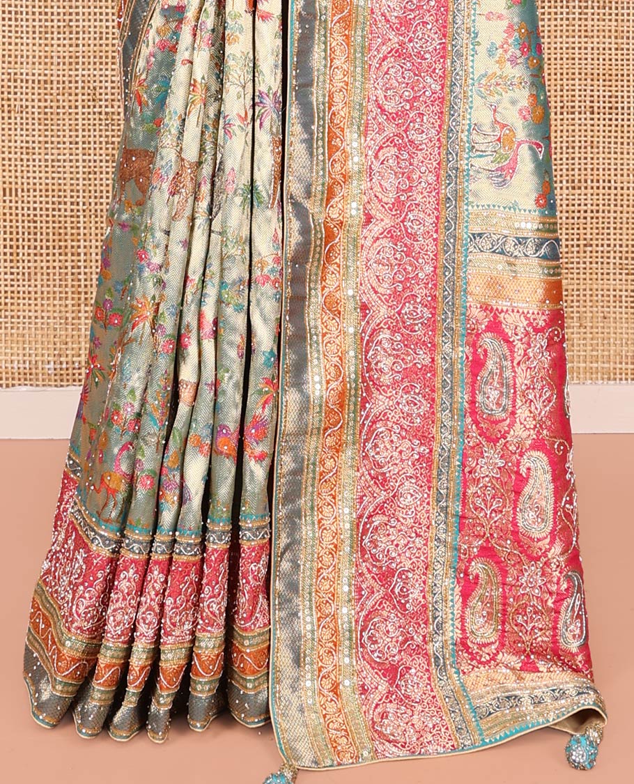 Blue Dola Silk Saree, Gracefully Embellished with Floral and Fauna Design on Its Body, Highlighted by Traditional Motif Stone Work Border, Pallu of Paisley Design, and Paired with a Contrast Blouse