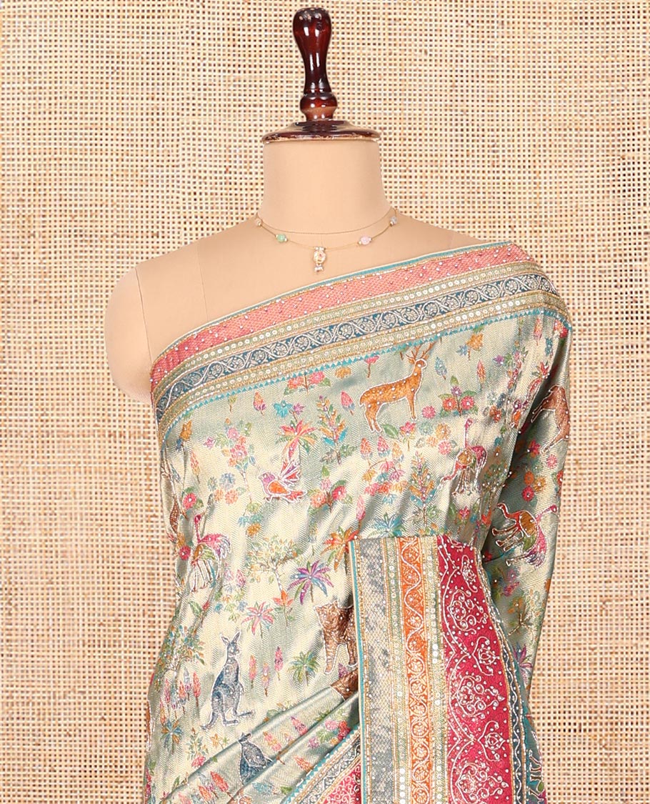 Blue Dola Silk Saree, Gracefully Embellished with Floral and Fauna Design on Its Body, Highlighted by Traditional Motif Stone Work Border, Pallu of Paisley Design, and Paired with a Contrast Blouse