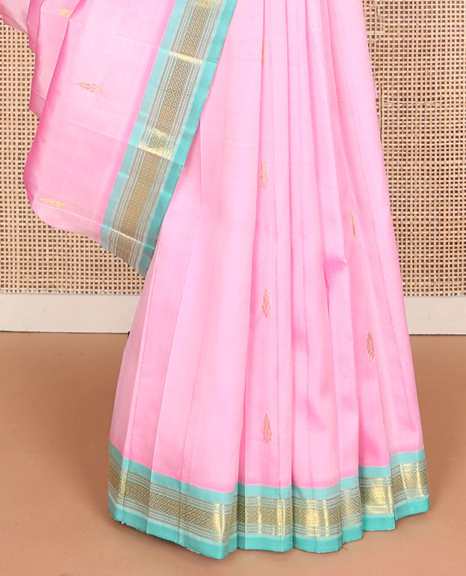 Pink kanchipuram silksaree with zari buttas, contrast one-sided zari border of Banaras, muthu & mayil kann & pallu of zari design