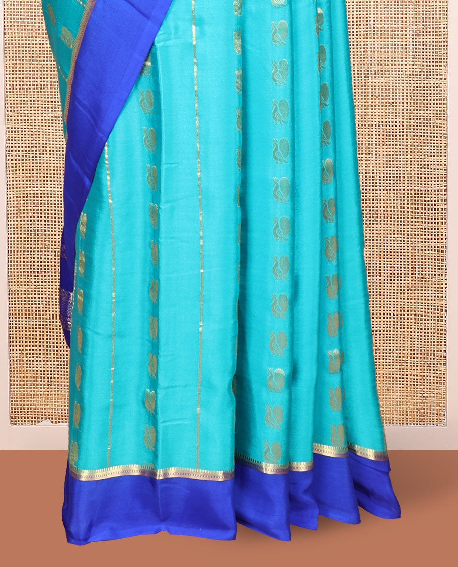 Blue Mysore Silk Saree, Adorned With Zari Stripes and Peacock Buttas Across Its Body, Complemented by Captivating Contrast Border of Traditional Zari Designs, Pallu Steeped with Traditional Zari Designs, and Paired with a Contrast Blouse