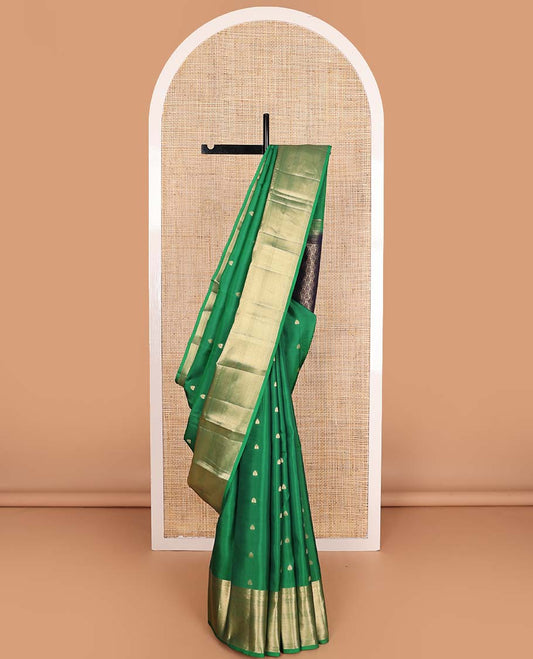 Green rettai manga buttas Vasundhara silk mix saree, traditional design zari border, and contrast intricate pallu