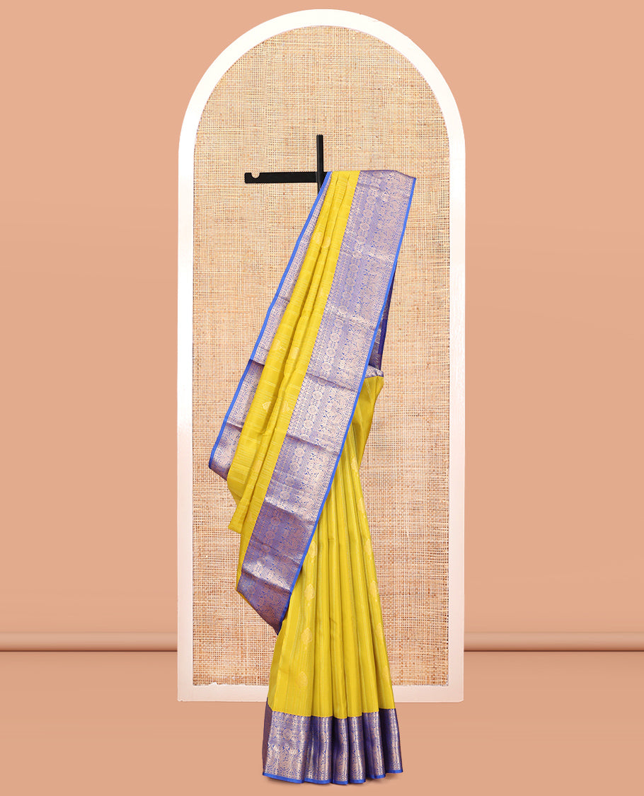 Green Vasundhara Lite Silk Mix Saree, Decked Up with Zari Designs, a Contrast Border of Manga Mokku, Rudraksham, Chakram, and Mayil Designs, Grand Pallu, and a Contrast Blouse