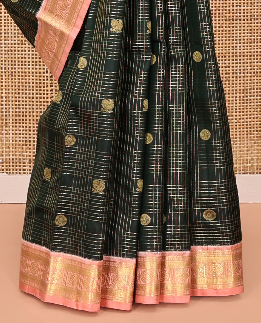 Green Vasundhara Silk Saree, Gracefully Embellished with Zari Butta Enclosed Checks All Over Its Body, Complemented by a Contrast Border of Banaras, Vanki, and Mayil Designs, Grand Pallu, and Paired with a Contrast Blouse