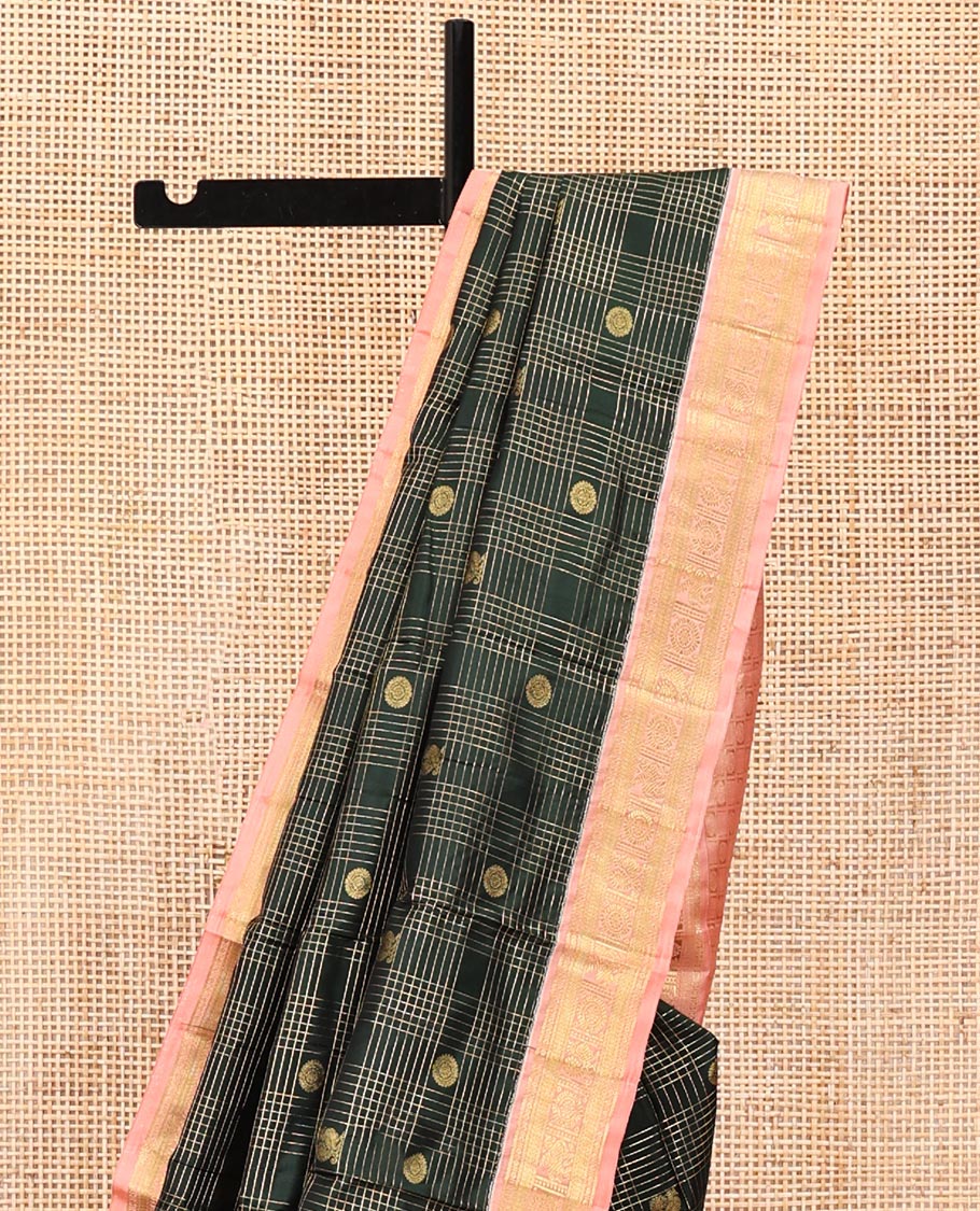Green Vasundhara Silk Saree, Gracefully Embellished with Zari Butta Enclosed Checks All Over Its Body, Complemented by a Contrast Border of Banaras, Vanki, and Mayil Designs, Grand Pallu, and Paired with a Contrast Blouse