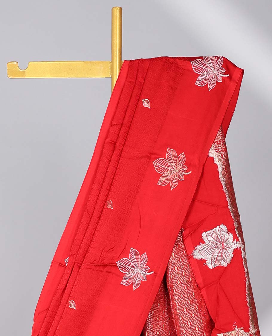 Red chevron design Mushru silk saree with buttas, leaf design border & pallu of jaal designs