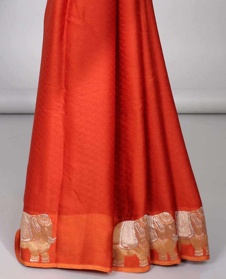Orange jaal design mushru silk saree, elephant design border & pallu of jaal design