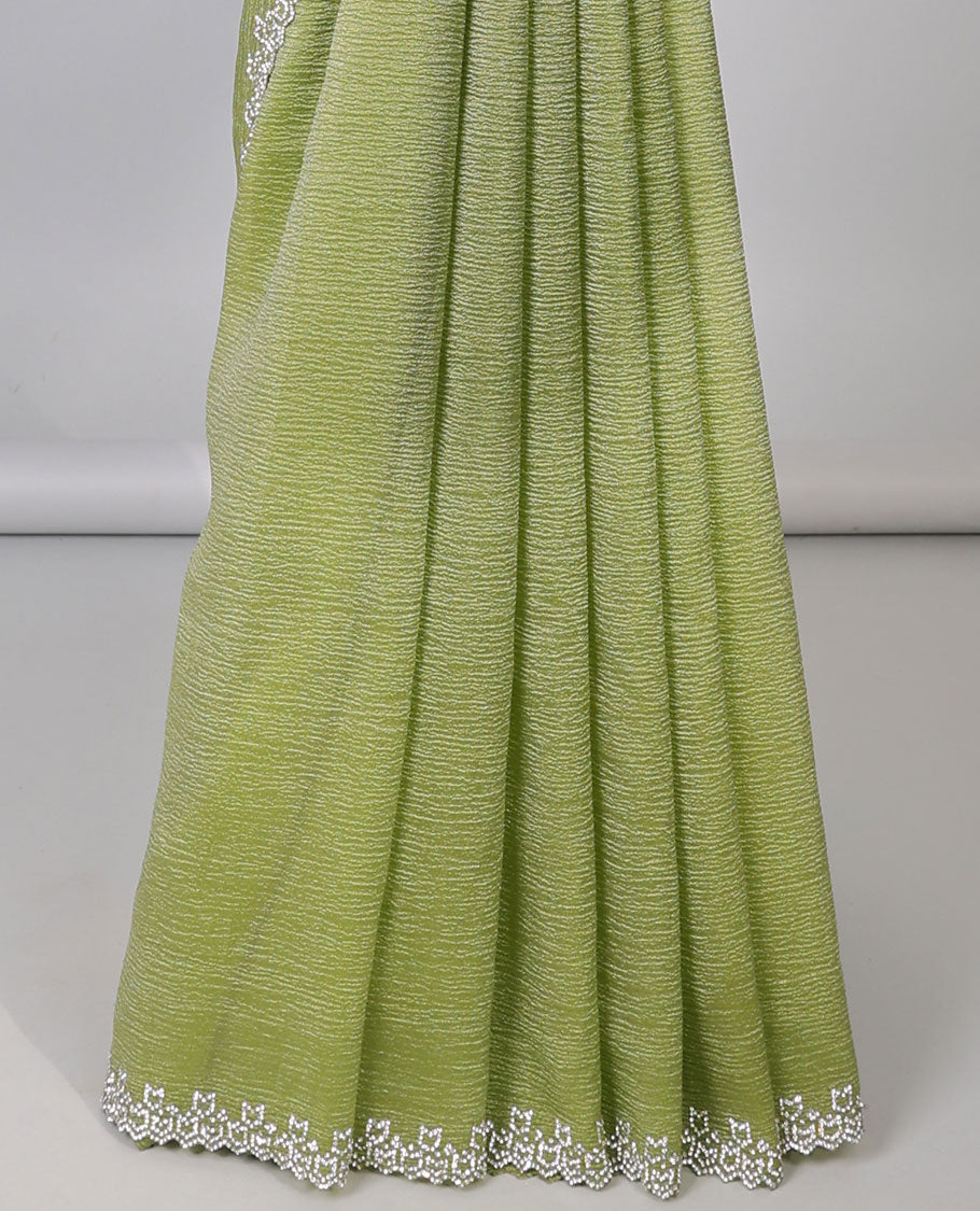 Green plain design designer saree, scallop stone embroidered border
