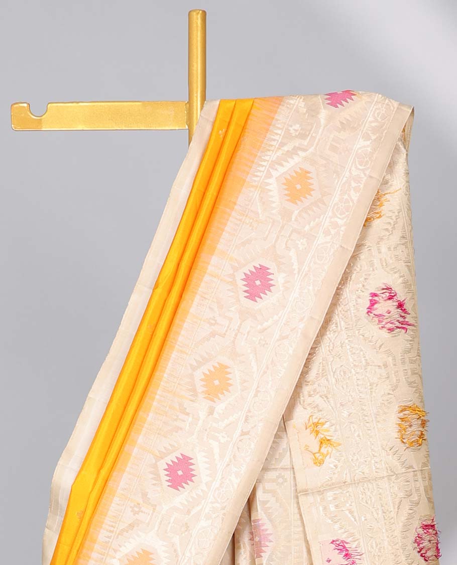 Orange soft silk saree with buttas, contrast border & pallu of patola-style meenakari designs