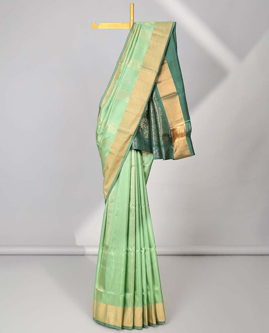 Green uppada silk saree with zari designs, contrast plain border & pallu of intricate designs